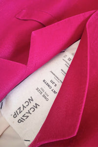 Pink velvet blazer constructor & fuchsia sleeve.