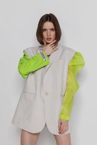 Linen jacket constructor, with fluffy lemon sleeves close up