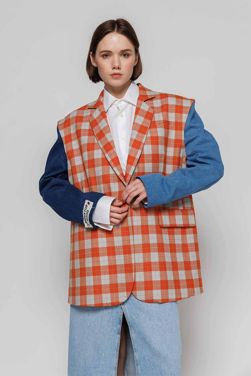Crepe jacket-constructor with orange-blue checked body, denim sleeves. Blazer