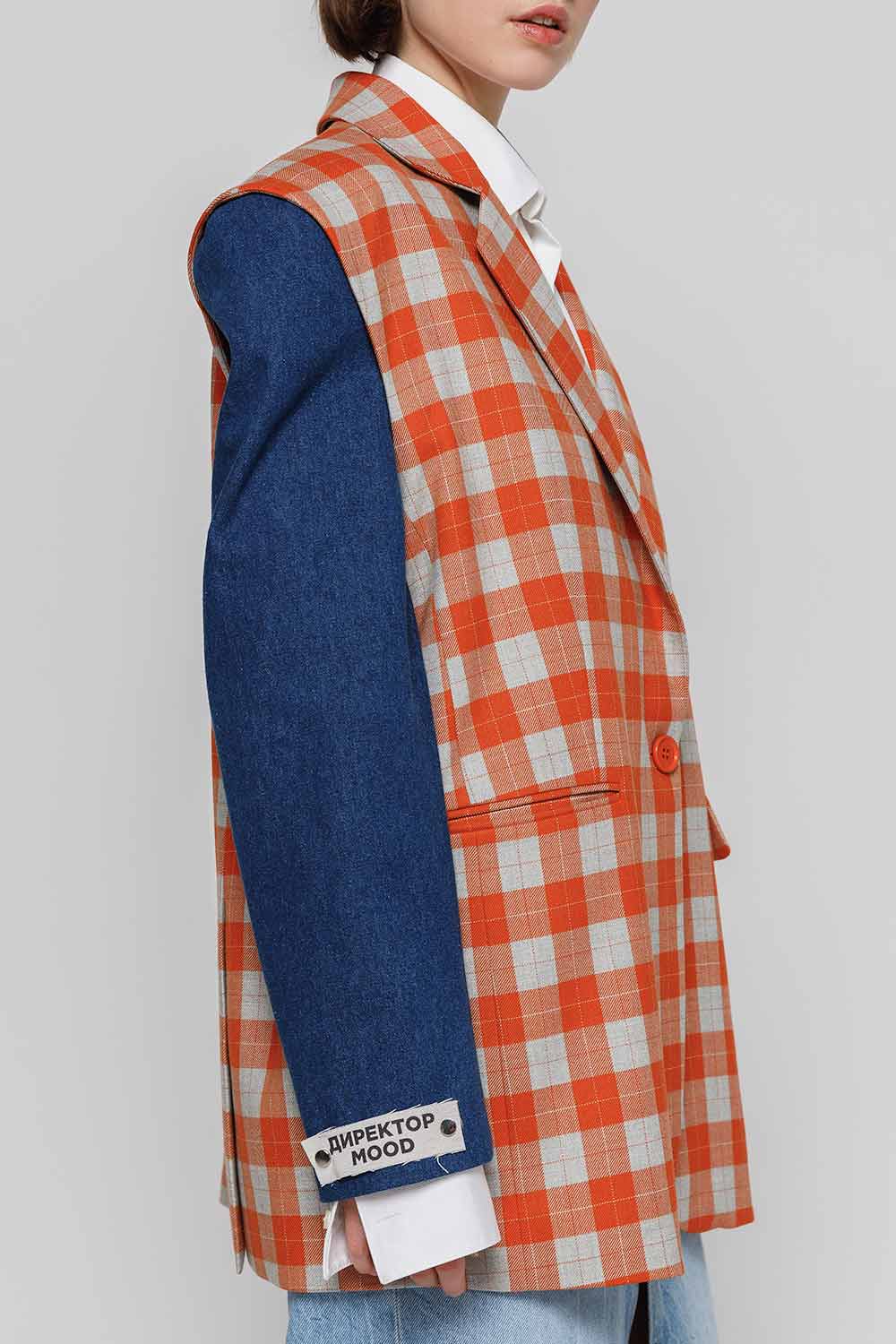 Crepe jacket-constructor with orange-blue checked body, denim sleeves side view. Blazer